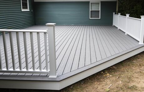 Composite backyard deck designed for outdoor entertaining Composite backyard deck designed for outdoor entertaining