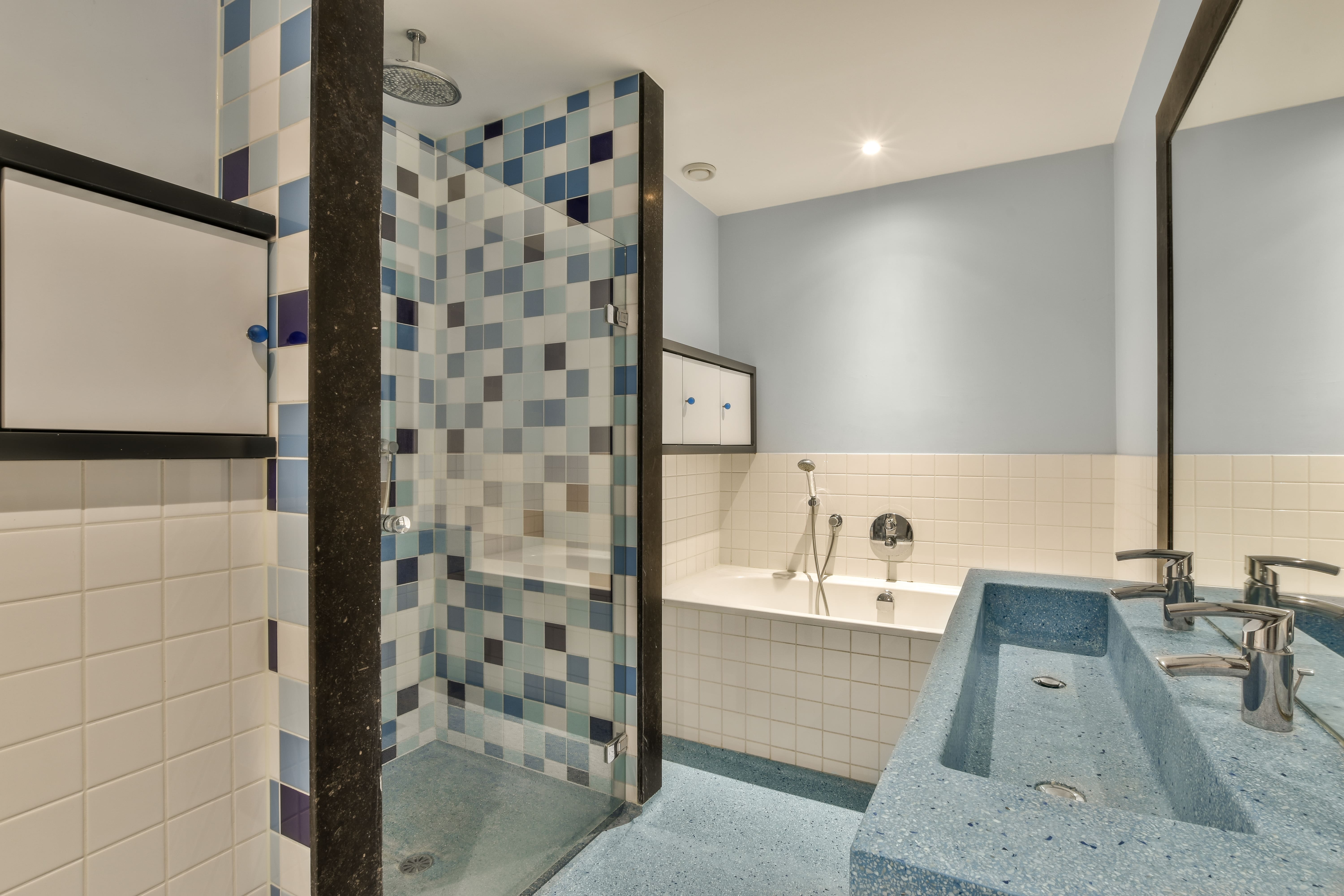 sinks-and-bathtub-near-shower-cabin-2025-02-12-00-32-36-utc-min