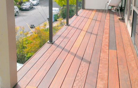 Spacious backyard deck with durable composite decking boards Spacious backyard deck with durable composite decking boards